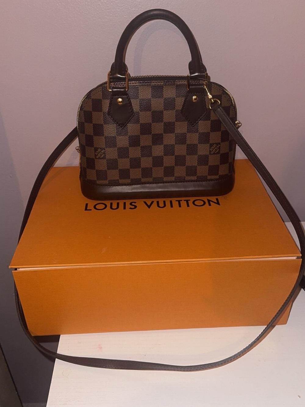 Louis Vuitton Damier Ebene Alma BB Satchel in Brown